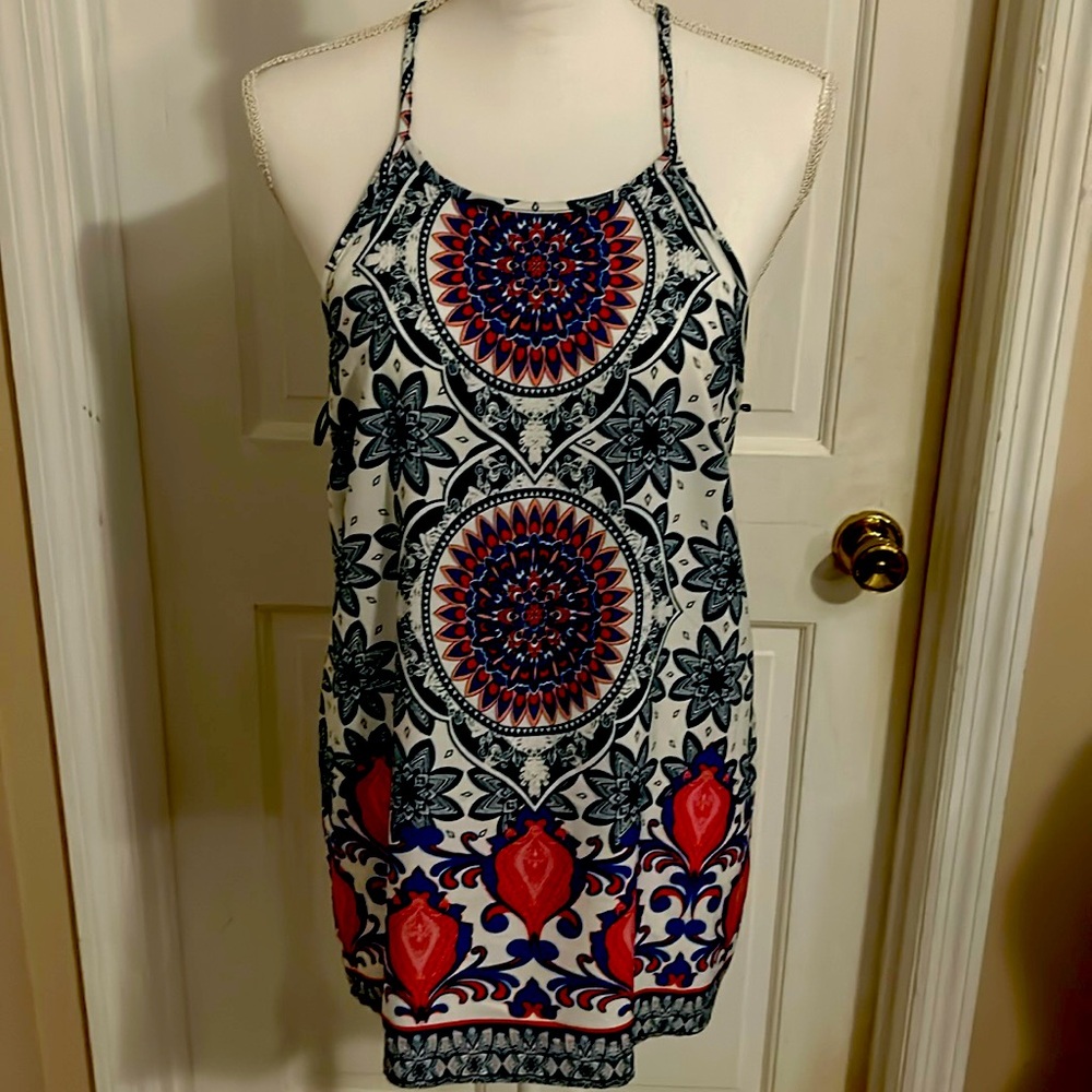 Women’s top brand Renee C size large colors are blue pink cream. Cute  ☀top.